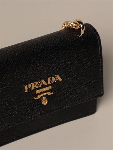 women prada black bag.